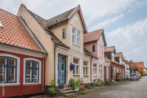 Fototapeta Naklejka Na Ścianę i Meble -  Old romantic houses on a cobblestone street in Ærøskøbing