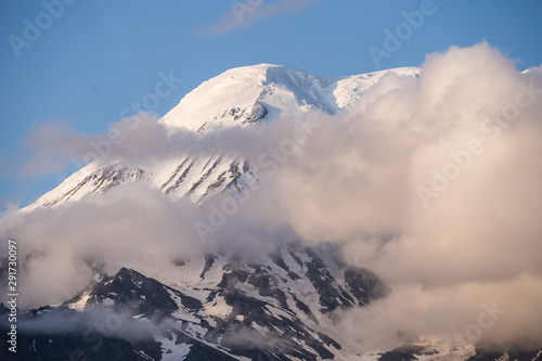 Picturesque summer volcanic landscape of Kamchatka Peninsula: view of active Volcano. © filin174