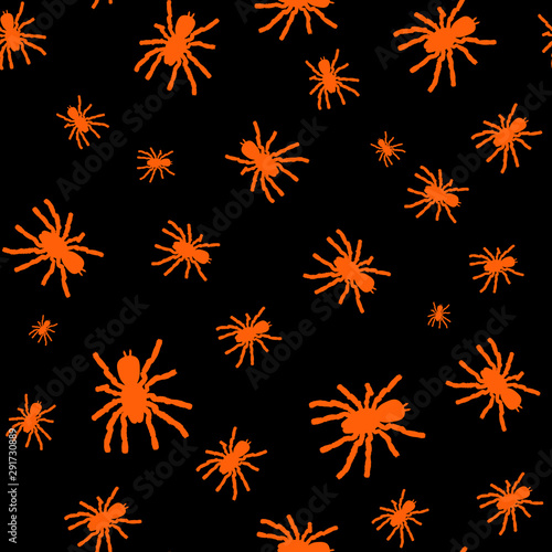 Photo Seamless pattern with orange silhouette of spider on black background