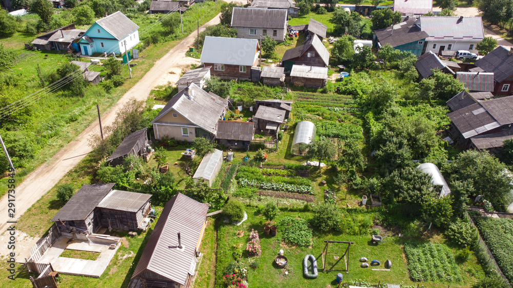 Aerial photography, view of the village from above, houses, streets, gardens Aerial photography, view of the village from above, houses, streets, gardens