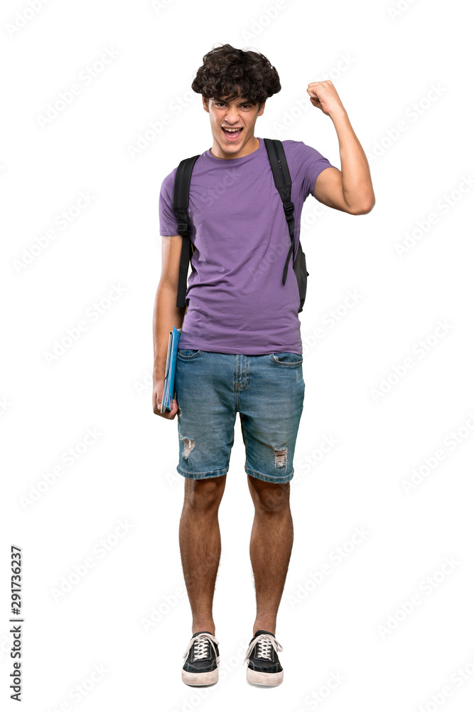 A full-length shot of a Young student man celebrating a victory over isolated white background A full-length shot of a Young student man celebrating a victory over isolated white background