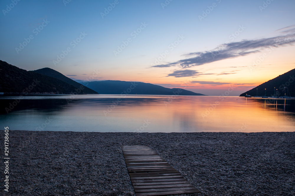 Naklejka premium Summer before sunrise in the early morning beautiful landscape of the Antisamos beach, Sami, Kefalonia island, Ionian sea, Greece.