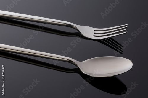 fork and spoon on black © Martin