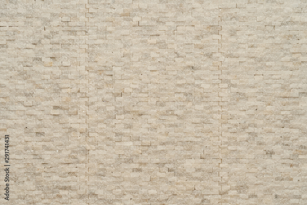 Fototapeta premium White modern decorative natural stone for inside. Panel wall small marble brick background texture, decorative pattern quartz stone mosaic. interior decoration of the room
