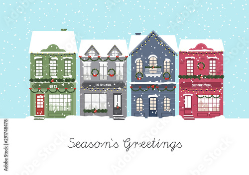 Cute Christmas houses. Winter village. Decorated Houses town. Season s Greetings. Vector