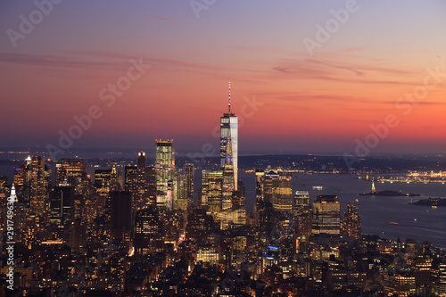 Aerial view of New York City skyline illuminated at sunset, USA
