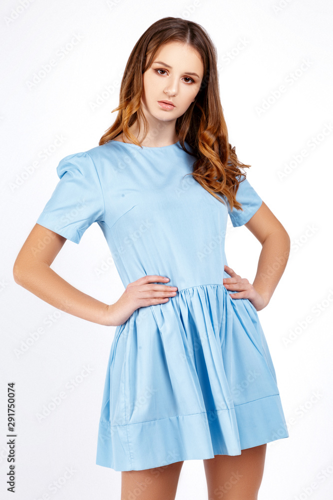 Girl in the studio on a white background