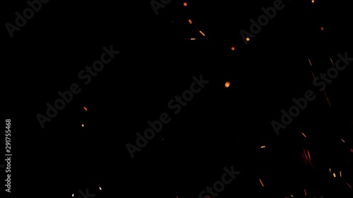 Fire embers on black background photo