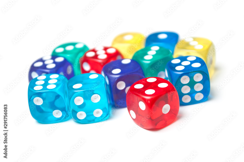 Closeup of colorful dices on white background Closeup of colorful dices on white background
