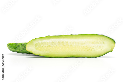 Group of two halves of fresh green pickling cucumber isolated on white background