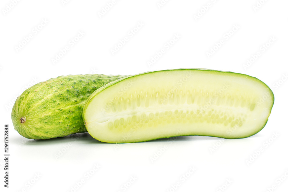 Group of one whole one half of fresh green pickling cucumber cross section isolated on white background Group of one whole one half of fresh green pickling cucumber cross section isolated on white background