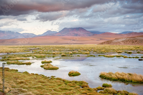 Volcanos, lagunas and desert of Atacama Desert. Mountains southern and northern from San Pedro de Atacama. Stunning scenery in sunlight at Atacama desert, Chile, South America