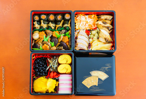 Japanese handmade new year dishes named Osechi-Ryori in the traditional box photo