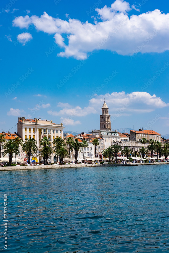 View of the Rive promenade and the old town of Split with blue water and blue sky, Dalmatia, Croatia. Split is the second largest city in Croatia and on the list of Unesco monuments