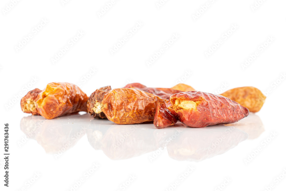 Lot of whole dry red chili pepper peperoncino isolated on white background Lot of whole dry red chili pepper peperoncino isolated on white background