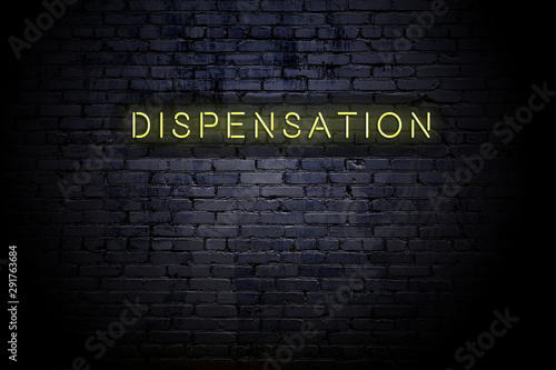 Highlighted brick wall with neon inscription dispensation