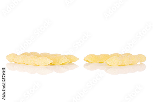 Group of five whole uncooked pasta cavatelli isolated on white background photo