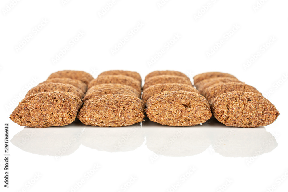 Lot of whole crispy brown cereal pillow isolated on white background Lot of whole crispy brown cereal pillow isolated on white background