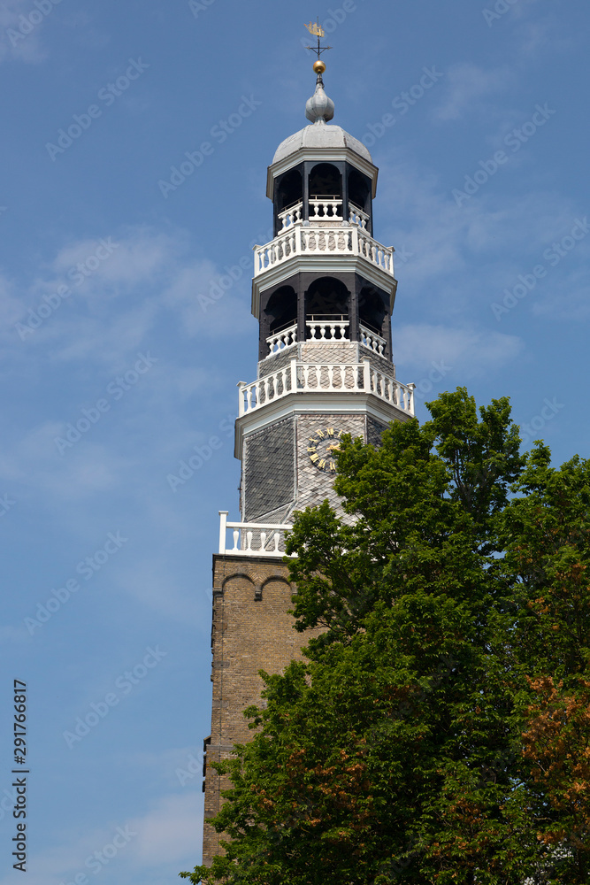 Monumental tower of church in historic Dutch city Hindeloopen