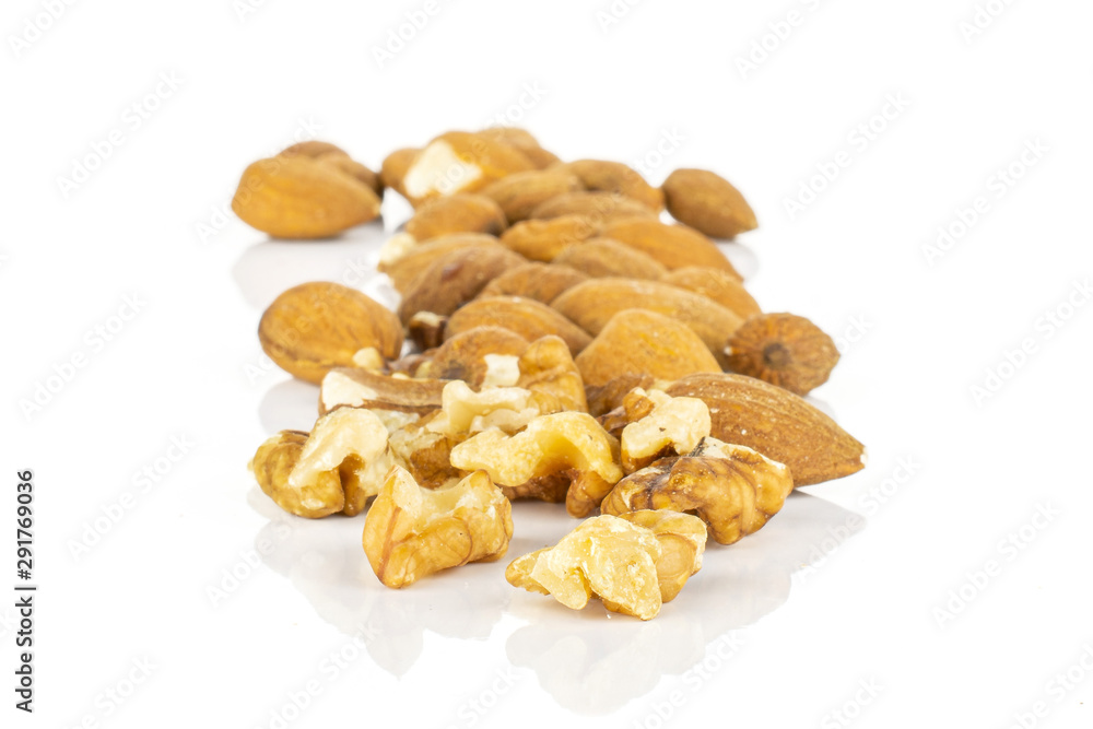 Lot of whole brown almond nut isolated on white background Lot of whole brown almond nut isolated on white background