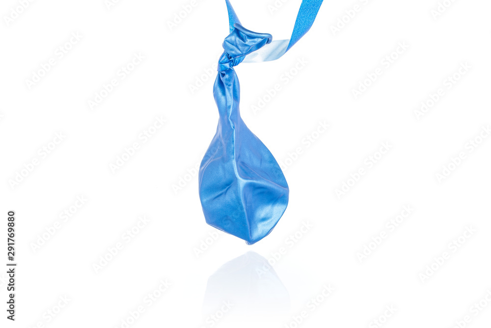 One whole blue latex pastel ballon deflated with blue ribbon isolated on white background