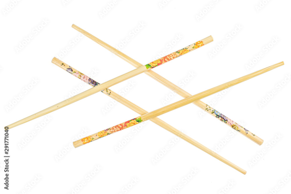 Group of four whole asian brown chopsticks flatlay isolated on white background Group of four whole asian brown chopsticks flatlay isolated on white background