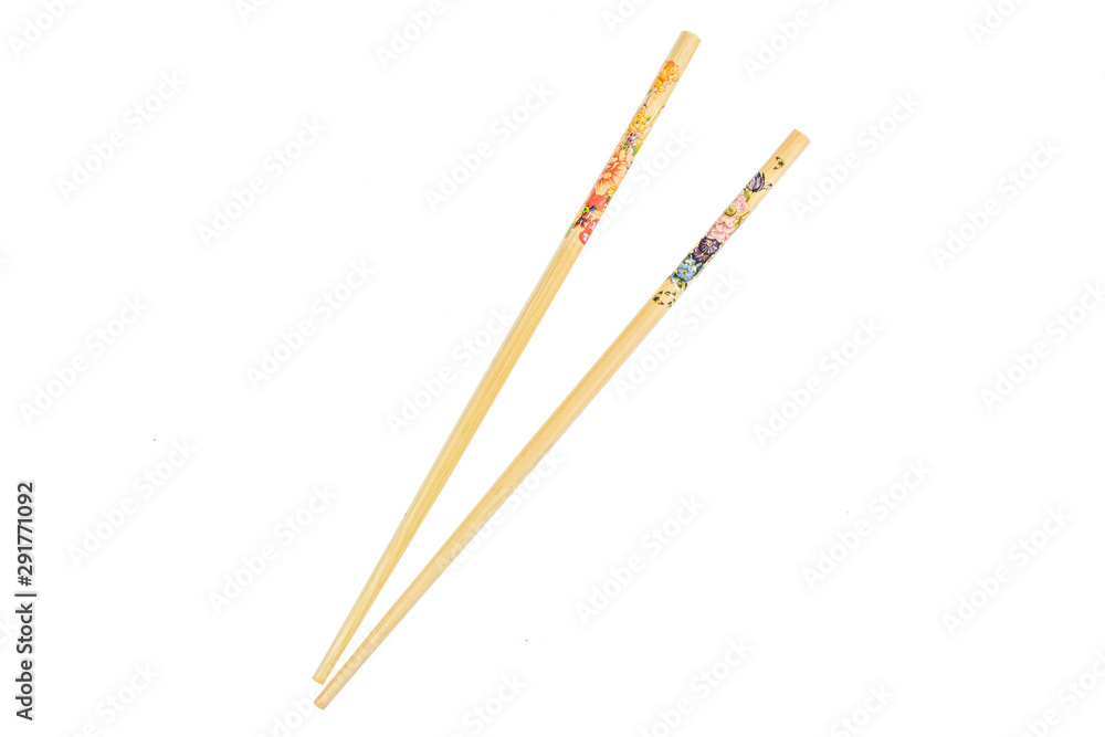 Group of two whole asian brown chopsticks flatlay isolated on white background Group of two whole asian brown chopsticks flatlay isolated on white background