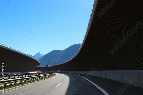 aerial view of the highway in the mountains from car window, Austria © Sergei Timofeev