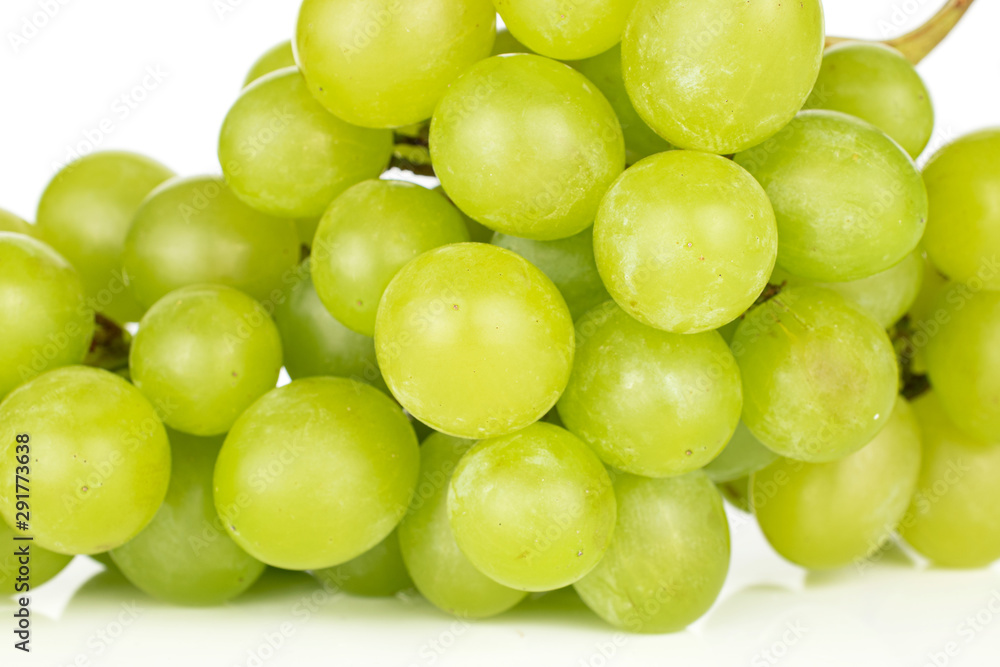 Lot of whole fresh green grape cluster closeup isolated on white background Lot of whole fresh green grape cluster closeup isolated on white background