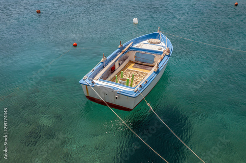 Moored boat in the port of Kokkari in Samos, Greece. © dutchlight