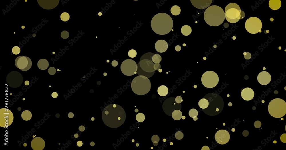 Golden confetti and bokeh lights on the black Merry Christmas background.