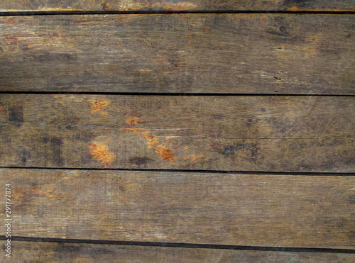 The texture of wood planks commonly used for benches or floors.