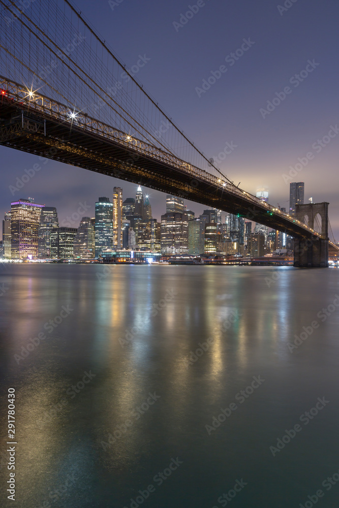 Brooklyn Bridge with Financial District at night with long exposure 