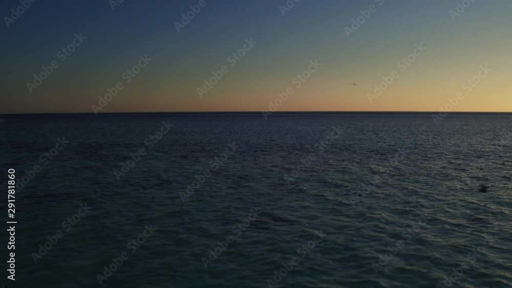 Australian sunset over ocean, wide aerial Australian sunset over ocean, wide aerial