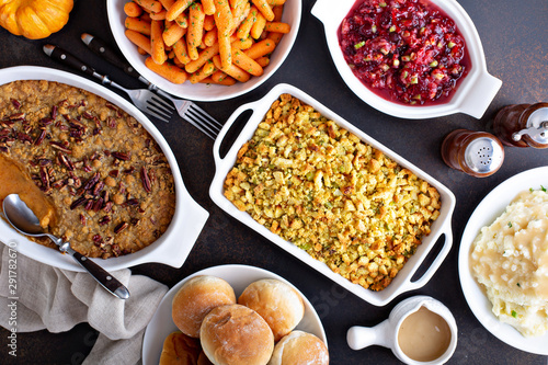 Принти на полотні Variety of Thanksgiving sides on the dinner table, carrots, mashed potatoes, swe