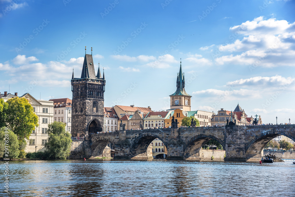 View of the city of Prague and the Charles Bridge and Vltava River.