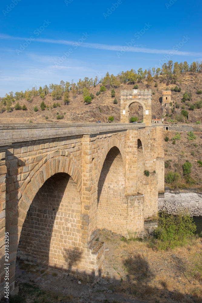 The Roman bridge of Alcantara is a two thousand year old stone bridge that crosses the Tagus River. Built by the Romans to connect an important commercial route.