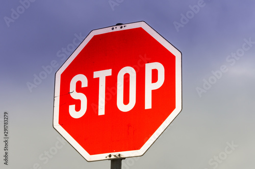 Stop sign with sky in the background