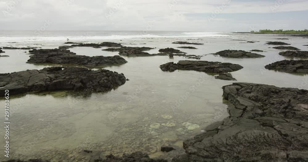 Slow motion aerial, rocky tide pools in Australia Slow motion aerial, rocky tide pools in Australia