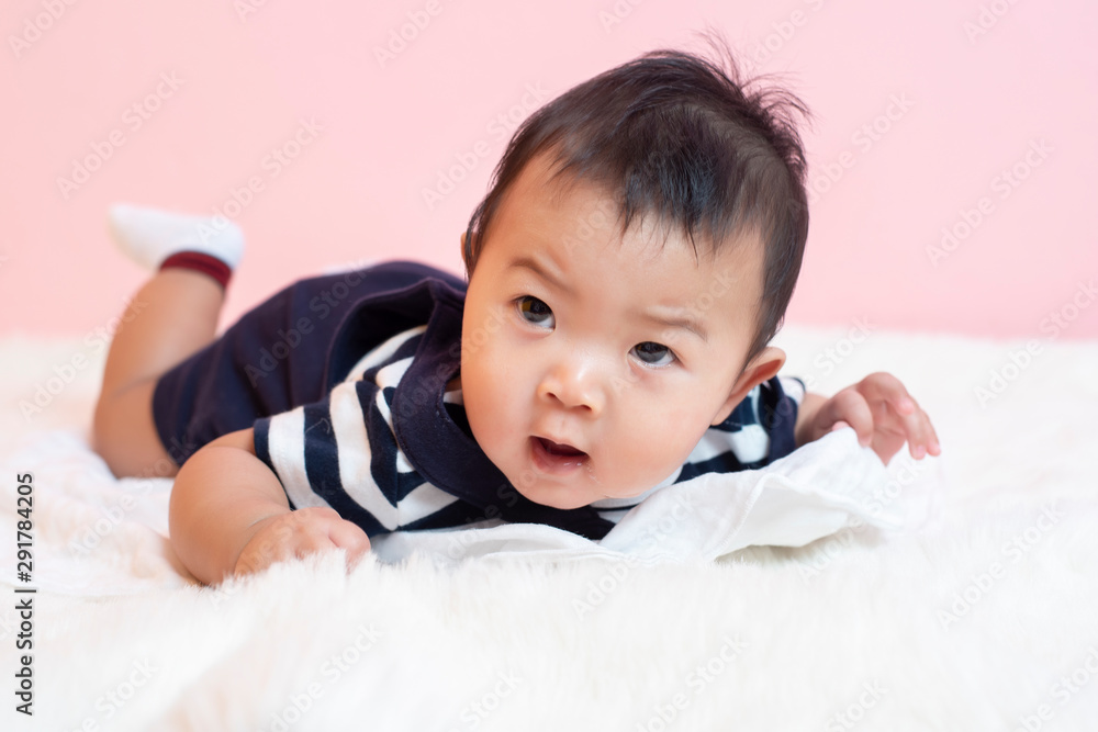Happy newborn cute baby in studio Happy newborn cute baby in studio