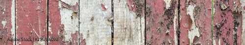 banner of Old wooden background with remains of pieces of scraps of old paint on wood
