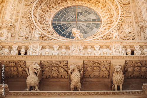 LECCE, ITALY /  SEPTEMBER 2019: The facade of the Basilica of Santa Croce in southern Italy.