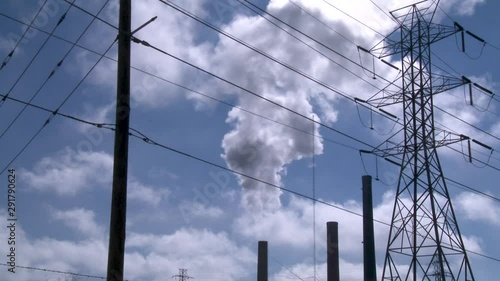 Factory releases plume of smoke, low angle