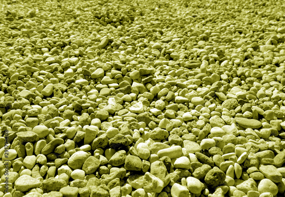 Pile of small gravel stones in yellow tone. Pile of small gravel stones in yellow tone.