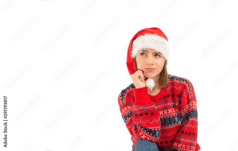 Girl with Santa hat dreaming about her present Girl with Santa hat dreaming about her present