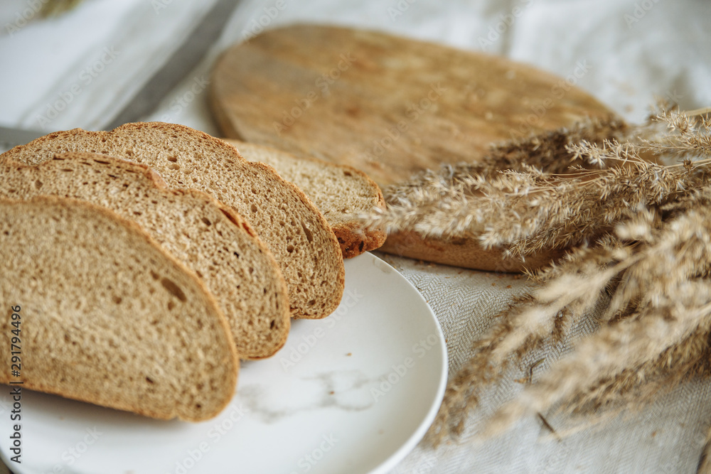 Sliced bread on a wooden board