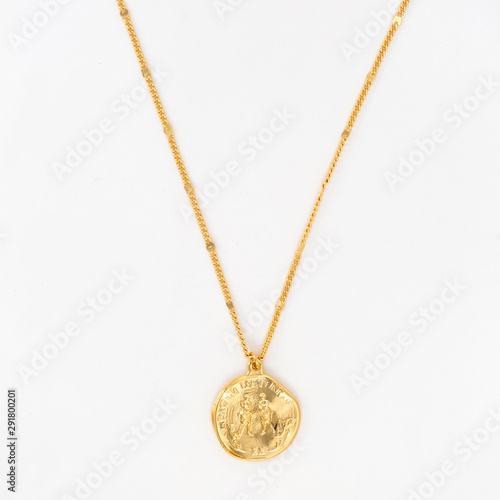 Obraz na plátně Vintage gold pendant necklace on gold chain, isolated