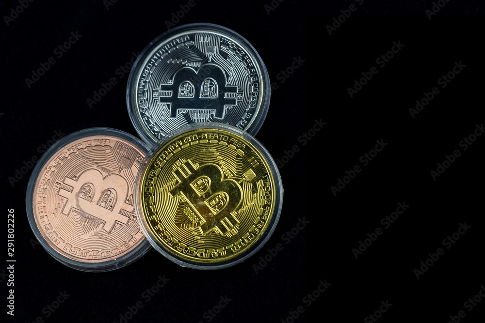 Bitcoin is a modern way of exchange and this crypto currency. bitcoin gold on Black background. Bitcoins and New Virtual money concept. Gold bitcoins Bitcoin is a modern way of exchange and this crypto currency. bitcoin gold on Black background. Bitcoins and New Virtual money concept. Gold bitcoins