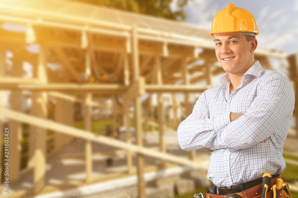 Male worker with tool belt isolated on white background Male worker with tool belt isolated on white background