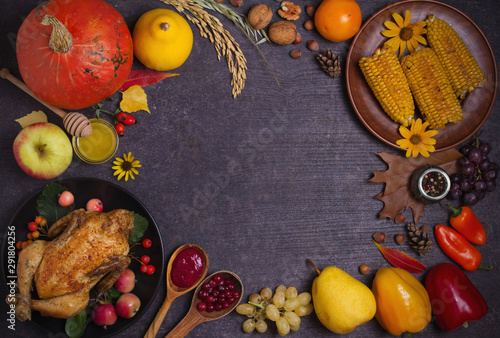 Chicken or turkey, autumn fruits and vegetables. Thanksgiving food concept. Harvest or Thanksgiving background. Flat lay, copy space, horizontal image